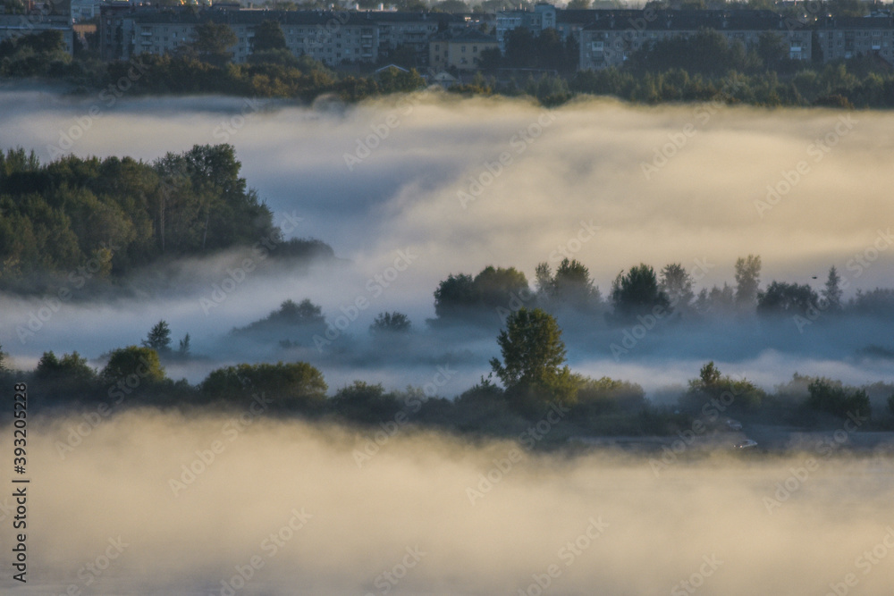 Fototapeta premium foggy dawn over the River Volga
