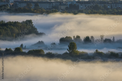 Fototapeta Naklejka Na Ścianę i Meble -  foggy dawn over the River Volga