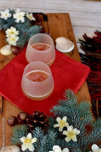 Seasonal Winter holiday tabletop decor for cozy sipping white wine relaxing at home