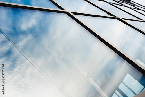 Glass cladding panels and windows of modern buildings. Geometry and Perspective