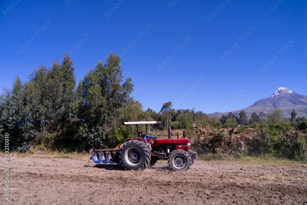 Obraz premium Tractor in a field