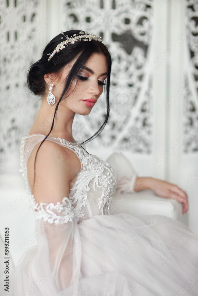 Beautiful brunette bride with fashion wedding hairstyle.Wedding concept