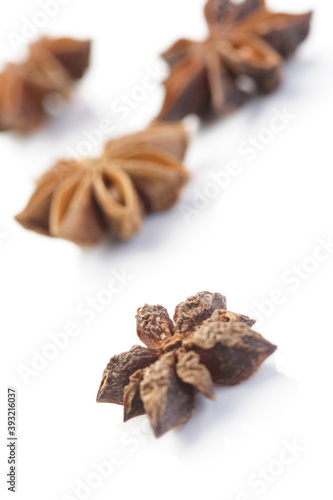 Close-up of anise on white background