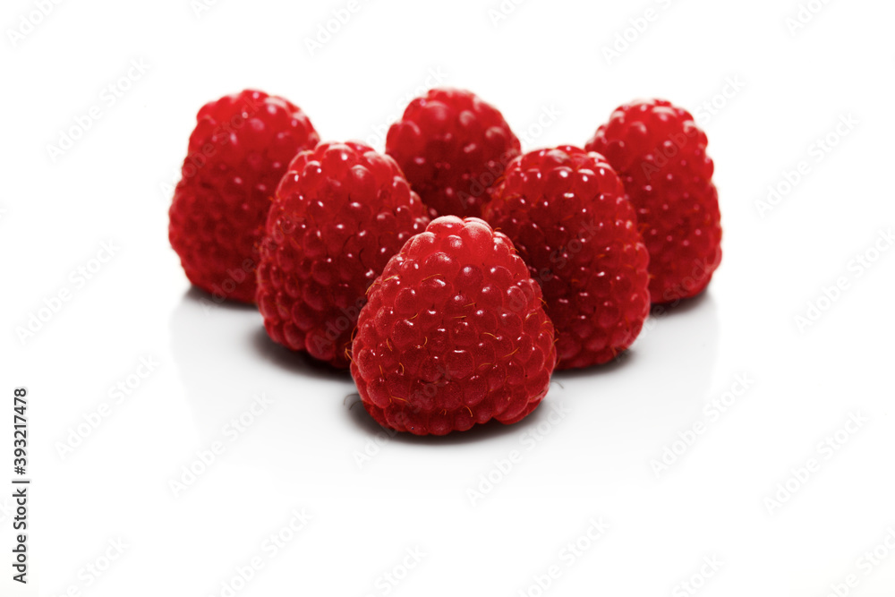Raspberries on white backbround - close-up Raspberries on white backbround - close-up