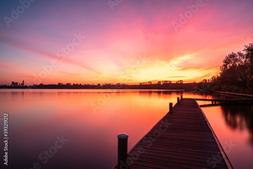 Pink sunset over Kralingen lake in Rotterdam