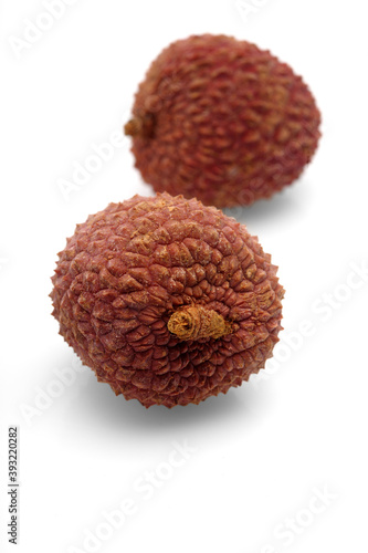 Lychee on white background - close-up