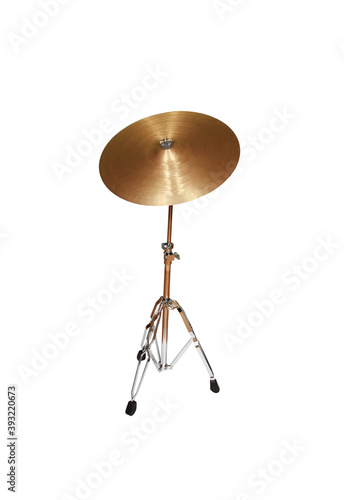 Golden drum cymbal on racks isolated on a white background