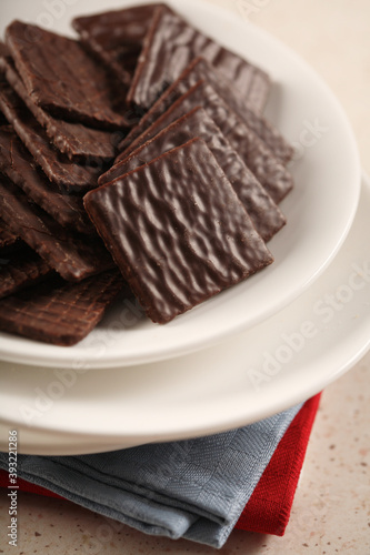 Chocolate cookies on white plate