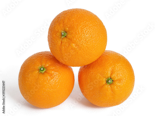 Photograph of three oranges on white background