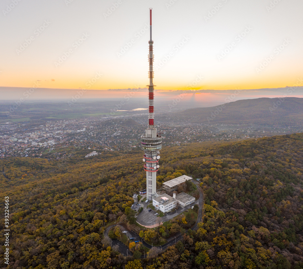 Hungary - TV tower in Pecs with Mecsek hills from drone view