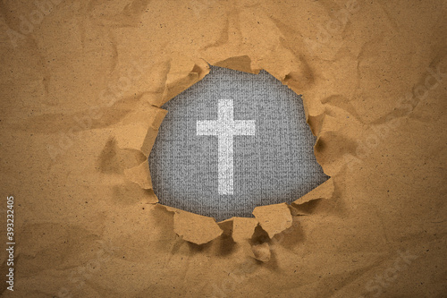 Photography Ripped paper with Christian cross