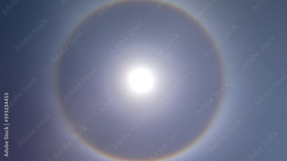 Perfectly full framed sun dog in blue sky