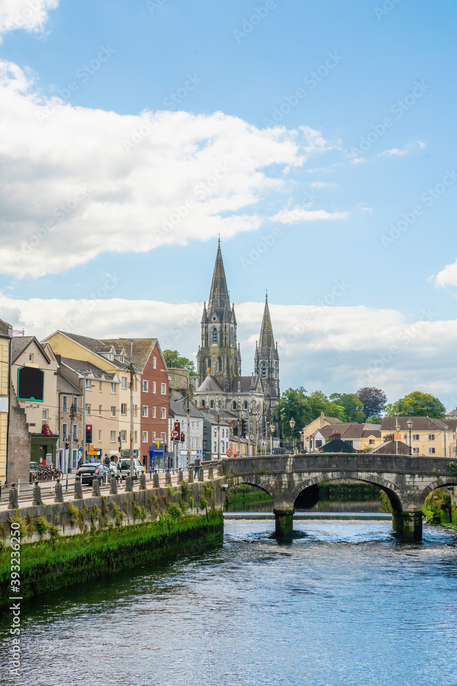 Saint Fin Barre's Cathedral and  south gate bridge on river Lee in Cork