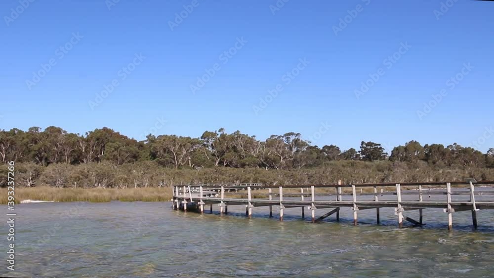 Static shot of Lake Clifton Thrombolites, shallow water and old jetty Static shot of Lake Clifton Thrombolites, shallow water and old jetty
