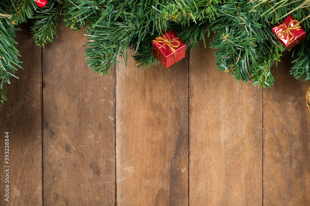 Christmas new year composition on wooden desk background. Fir branches, christmas decoration. Flat lay, top view, copy space Christmas new year composition on wooden desk background. Fir branches, christmas decoration. Flat lay, top view, copy space