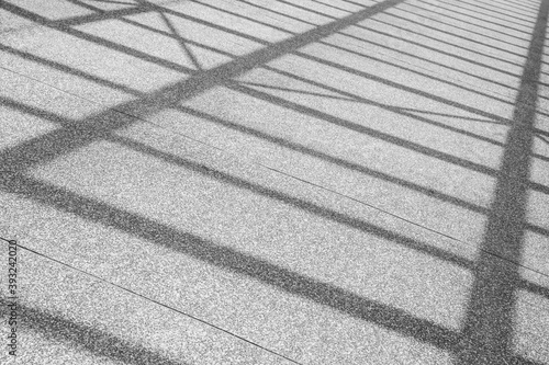 Abstract stripe shadow lines on ground. 
