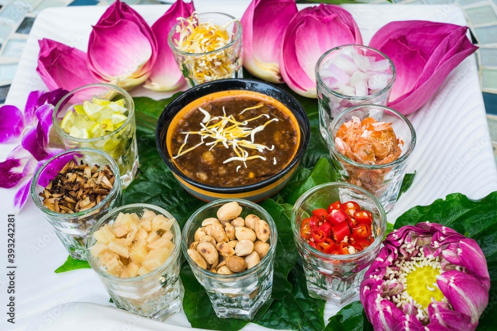 Set of Fresh Lotus Petal Wrapped Bite Size Appetizer with Sweet and Spicy Dips. Thai Style Fresh Healthy food.