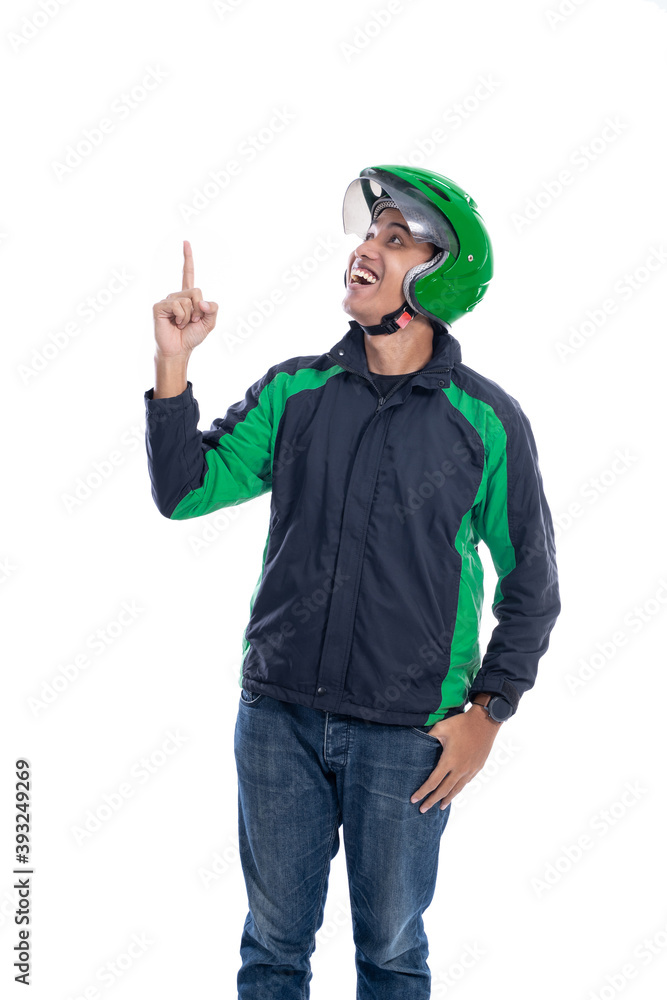 uber taxi driver with helmet pointing to blank white copy space uber taxi driver with helmet pointing to blank white copy space