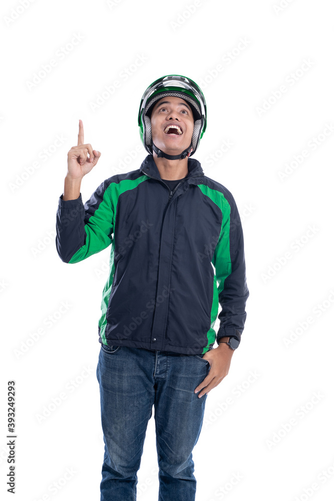 uber taxi driver with helmet pointing to blank white copy space uber taxi driver with helmet pointing to blank white copy space