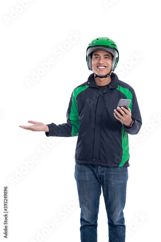 taxi driver with helmet presenting blank space over white background