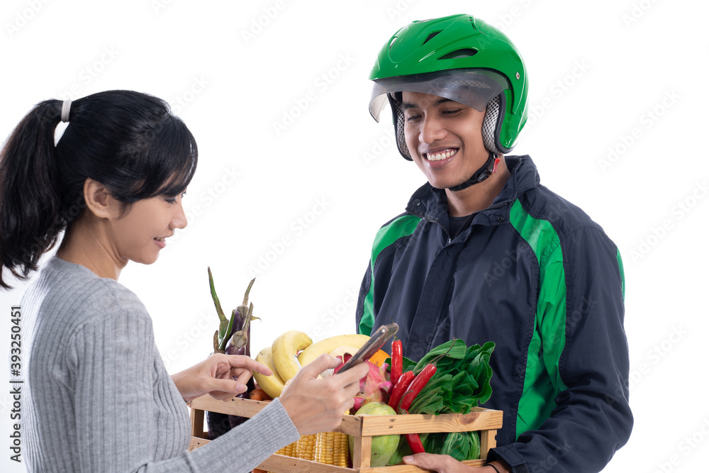 grocery store delivery. driver courier with food sending online order to female customer isolated over white