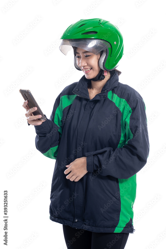 asian beautiful delivery courier with helmet holding smartphone isolated over white background asian beautiful delivery courier with helmet holding smartphone isolated over white background