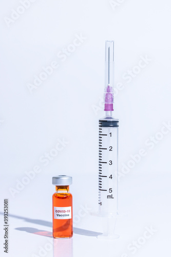 vaccine bottle syring needle injection protect covid19 contagious disease on white background clipping path