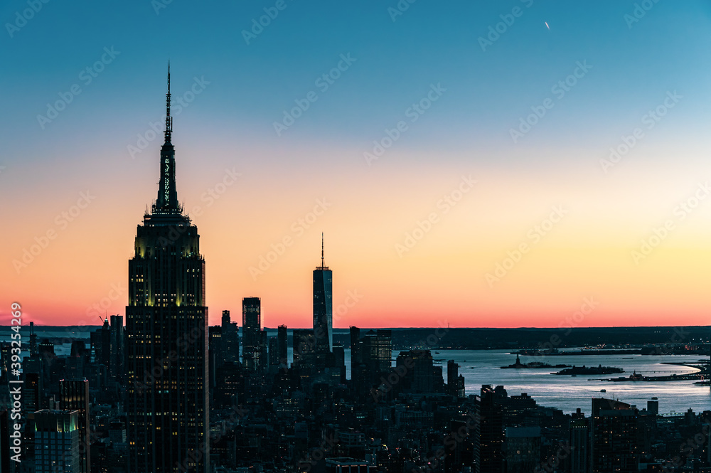 Empire State building at New York City during sunset.