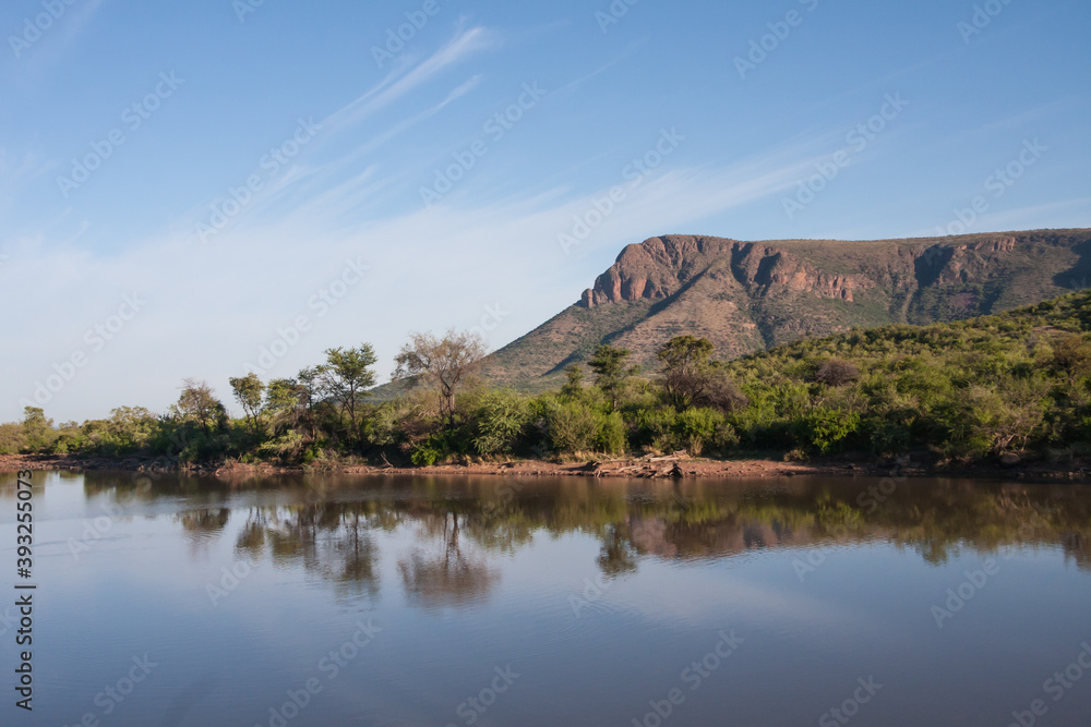 Tlopi Dam scenic view with reflections in the water in Marakele National Park, Limpopo Province, South Africa