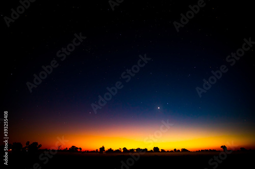 Night scenery with colorful and light yellow Milky Way Full of stars in the sky.