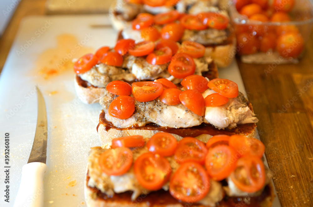 Making Chicken Tomato Sandwiches with Barberu Sauce. Making Chicken Tomato Sandwiches with Barberu Sauce.
