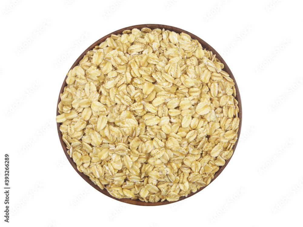 Oat flakes in wooden bowl isolated on white background, top view Oat flakes in wooden bowl isolated on white background, top view
