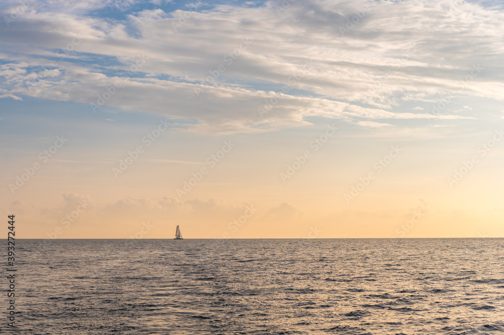 Beautiful light at sunset in the sea in summer.
