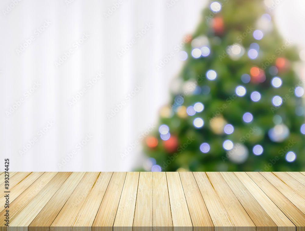 Empty table top with blurred Christmas tree with bokeh light background Empty table top with blurred Christmas tree with bokeh light background