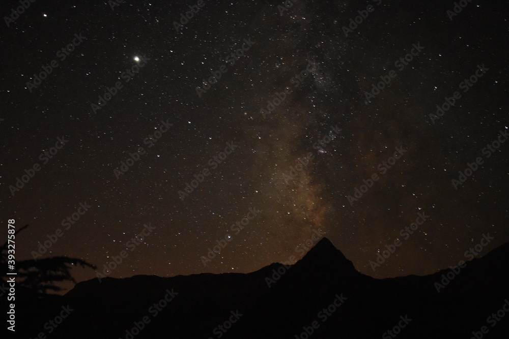 Fototapeta premium Stars from milky way and mountains