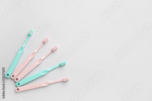 Toothbrushes on light background