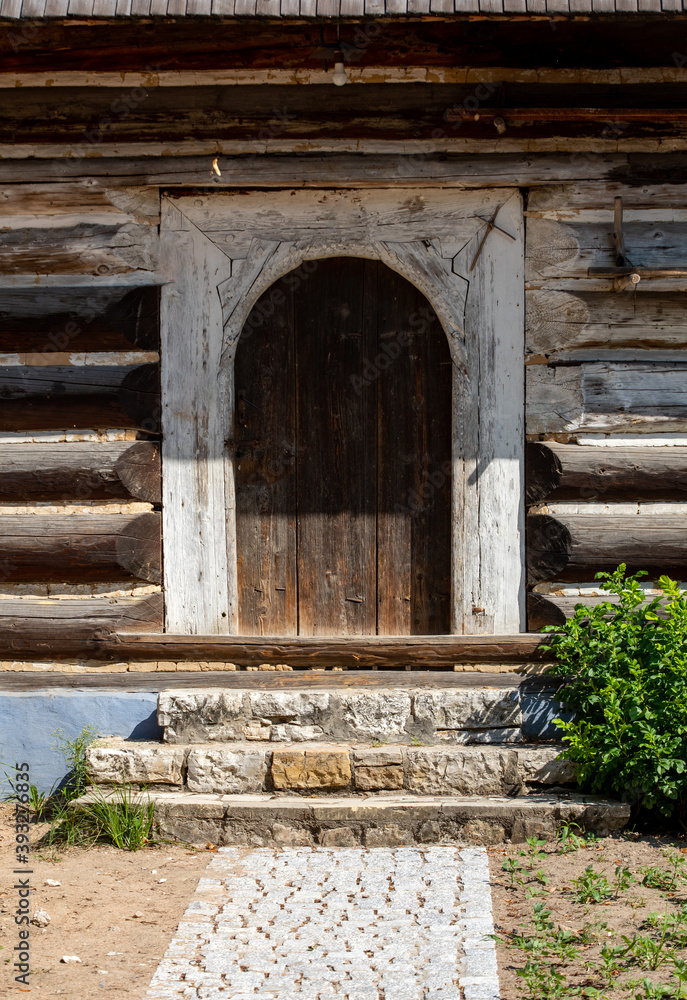 wooden door in rustic old peasant house