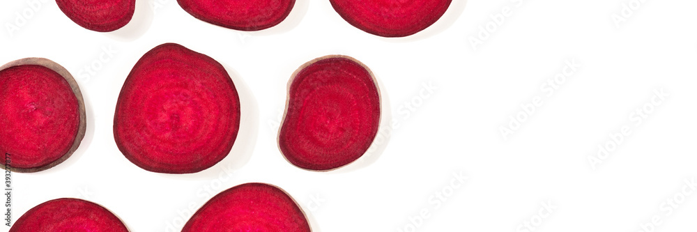 Beet flat lay panorama, overhead shot with a place for text, beetroot on a white background Beet flat lay panorama, overhead shot with a place for text, beetroot on a white background