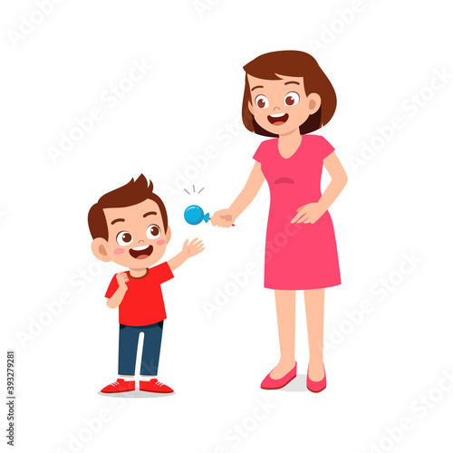 happy mother give candy and sweets to his boy and girl kid