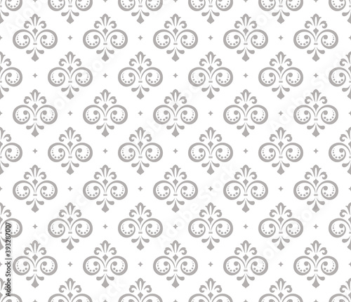 Wallpaper in the style of Baroque. Seamless vector background. White and gray floral ornament. Graphic pattern for fabric, wallpaper, packaging. Ornate Damask flower ornament.