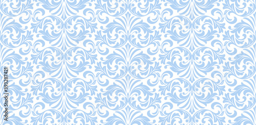 Wallpaper in the style of Baroque. Seamless vector background. White and blue floral ornament. Graphic pattern for fabric, wallpaper, packaging. Ornate Damask flower ornament
