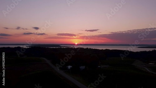 Sun setting over a grape vineyard in Northern Michigan, United States. photo