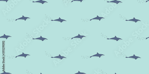 Dolphin seamless pattern  A cute Dolphin on a blue background. 