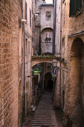 Fototapeta Naklejka Na Ścianę i Meble -  View of an alley in the city of Perugia,Italy