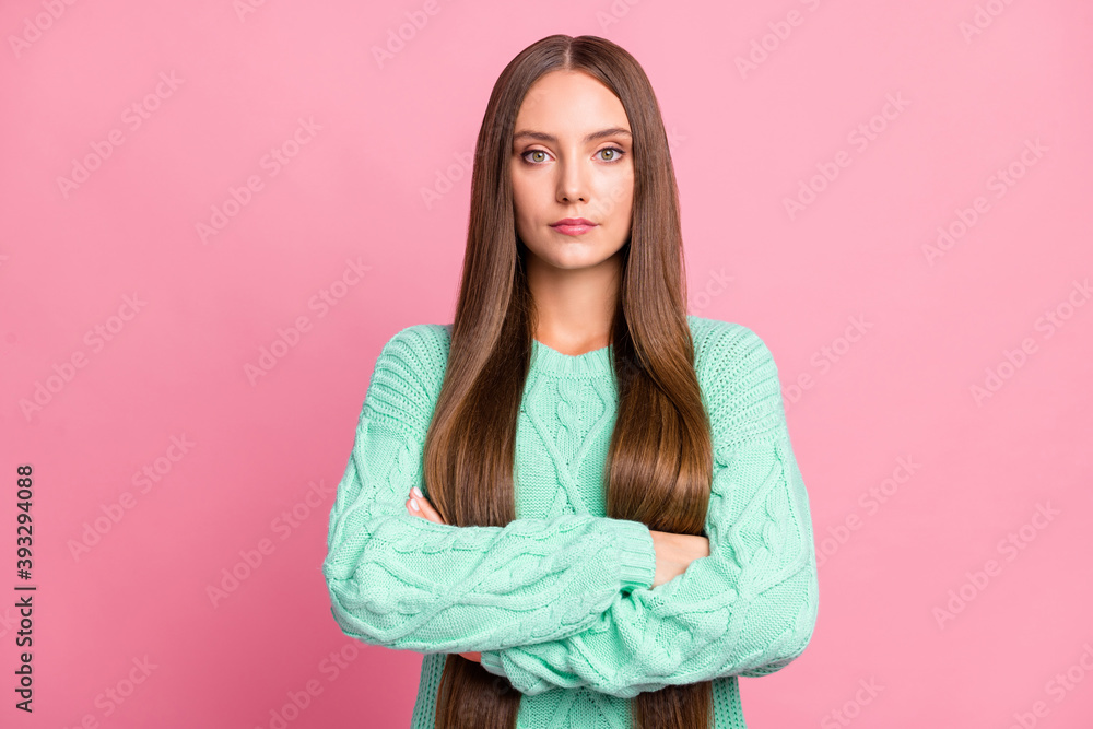 Portrait of good looking young lady crossed arms wear turquoise pullover isolated on pink color background Portrait of good looking young lady crossed arms wear turquoise pullover isolated on pink color background