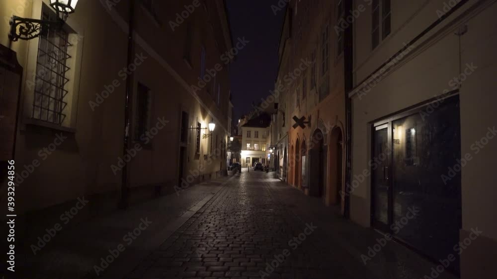 Empty narrow street in Prague center,Czechia,lanterns on houses,lockdown. Empty narrow street in Prague center,Czechia,lanterns on houses,lockdown.