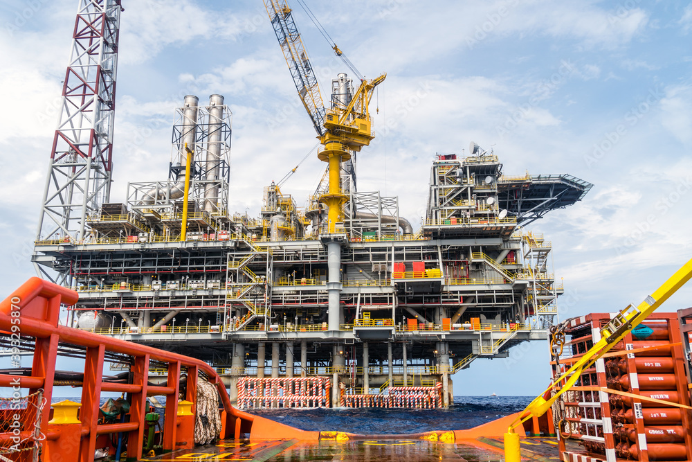 An oil production platform complex view from a vessel at oil field