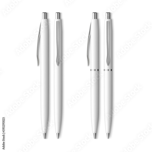 A set of white ballpoint pens.