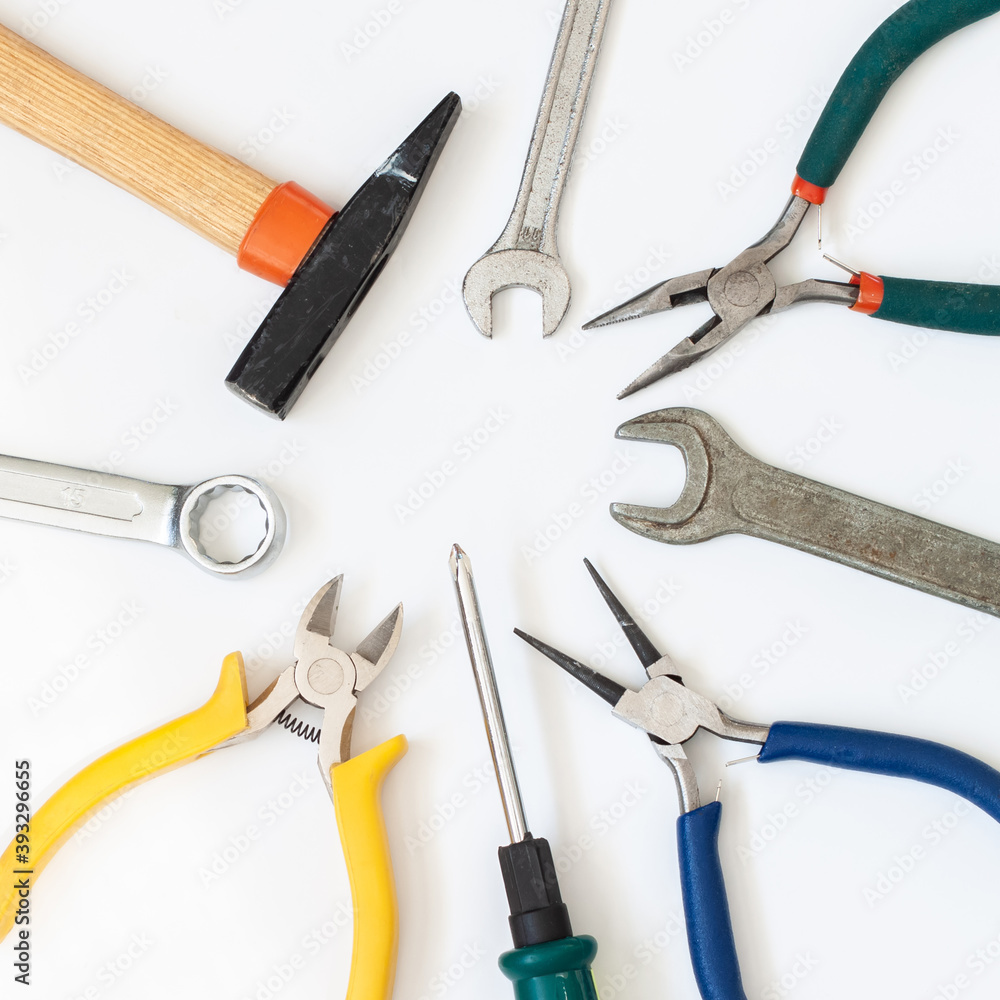 Set of different tools hammer, pliers, screwdriver, wrenches isolated on white background square Set of different tools hammer, pliers, screwdriver, wrenches isolated on white background square