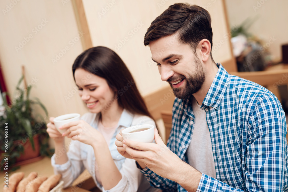 Happy Young Couple Have Date in Modern Cafeteria. Happy Young Couple Have Date in Modern Cafeteria.